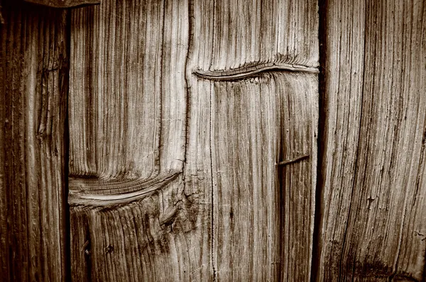Nahaufnahme der körnigen Holzstruktur mit Knoten — Stockfoto