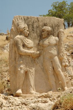Historic monument on Mount Nemrut in Turkey clipart