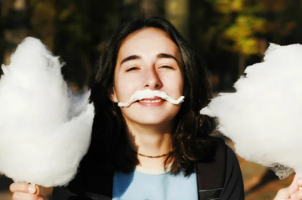 Girl with a cotton candy mustache — Stock Photo, Image