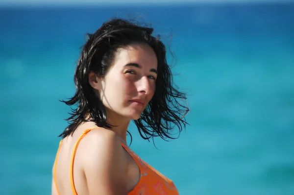 Beautiful woman on a beach — Stock Photo, Image