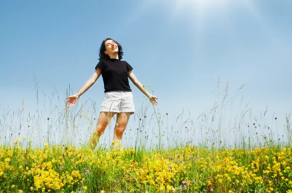 Beautiful young girl enjoying sunshine — Stock Photo, Image