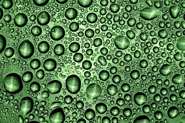Bolle d'aria astratte su sfondo verde — Foto Stock