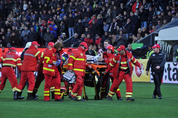 Paramedics in action at a soccer game — Stock Photo, Image