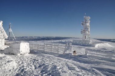 An ice-covered meteorological station clipart