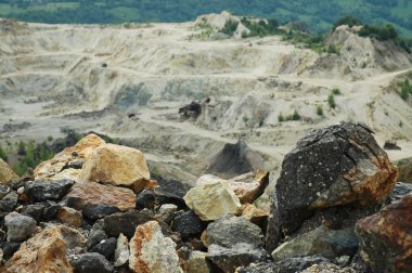 Gold mine open pit excavation, Rosia Montana, Romania clipart