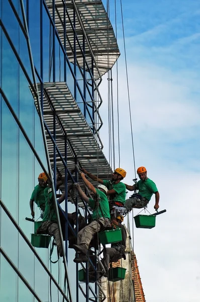 stock image Workers washing the windows facade