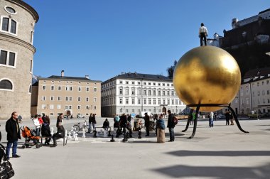 Tourists in the historical center of Salzburg clipart