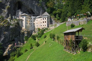 Medieval Predjama castle clipart