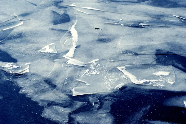 Ice pieces of frozen blue water