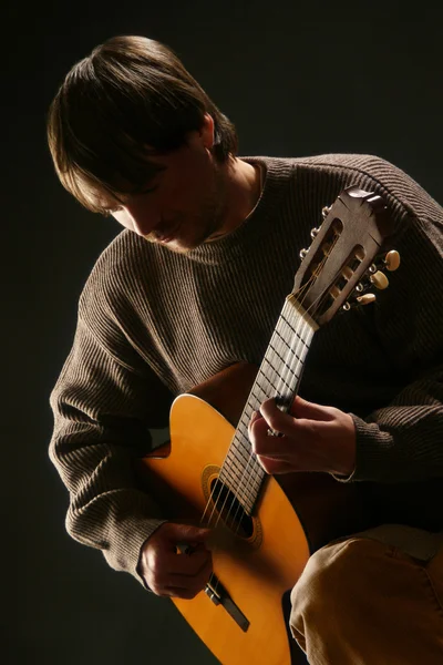 stock image Guitarist. Man playing acoustic guitar