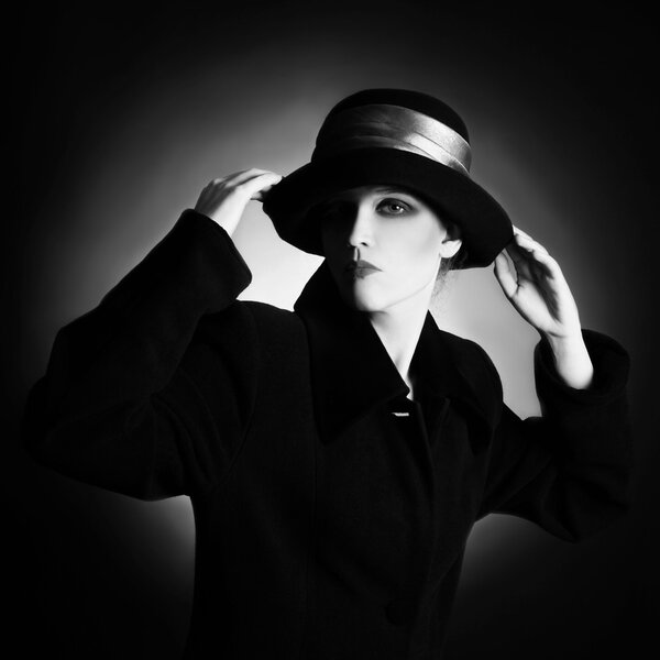 Fashion portrait of elegant woman in black and white