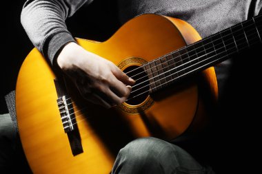 Acoustic guitar guitarist playing. clipart