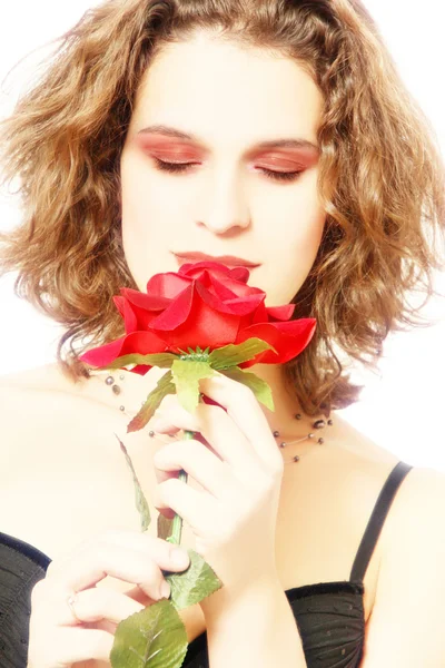 Porträt einer Frau mit roter Rose — Stockfoto
