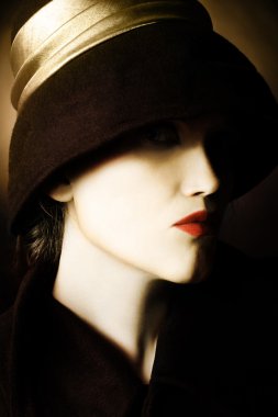 Retro woman in black hat. clipart