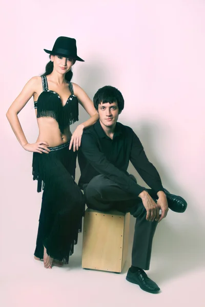 Couple in black dancers costume — Stock Photo, Image