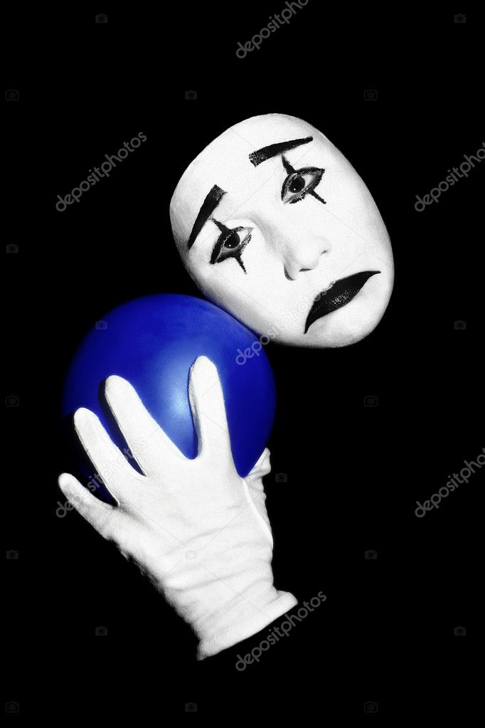 Sad mime with balloon
