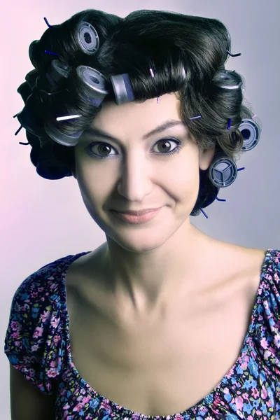 Hair-rollers on woman head — Stock Photo, Image
