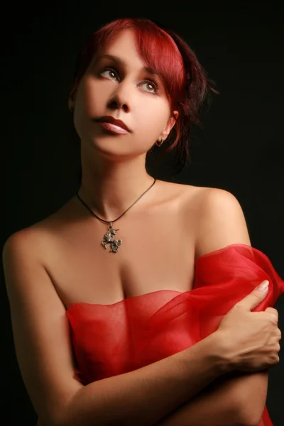Piękna kobieta w czerwieni — Zdjęcie stockowe