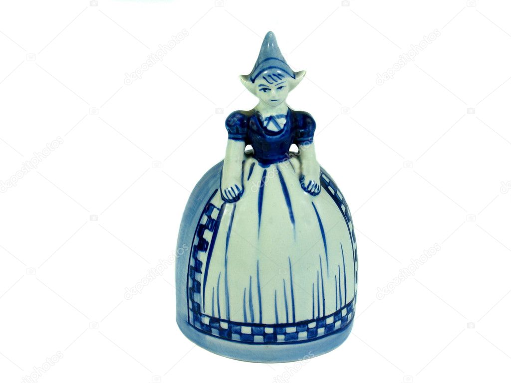 Traditional Dutch Delft figurine bell isolated