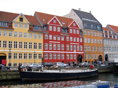 Copenhagen - houses and boats in the water front clipart