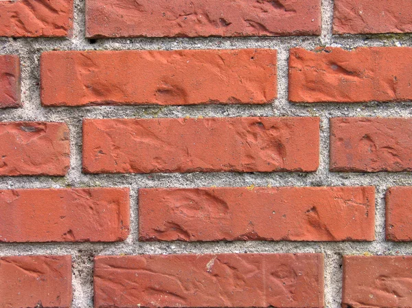 Muur van rode bakstenen — Stockfoto
