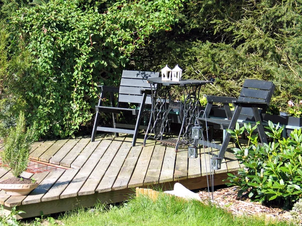 Wooden deck in a garden — Stock Photo, Image