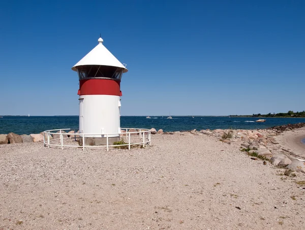 Small Lighthouse by the sea shore — Stock Photo, Image