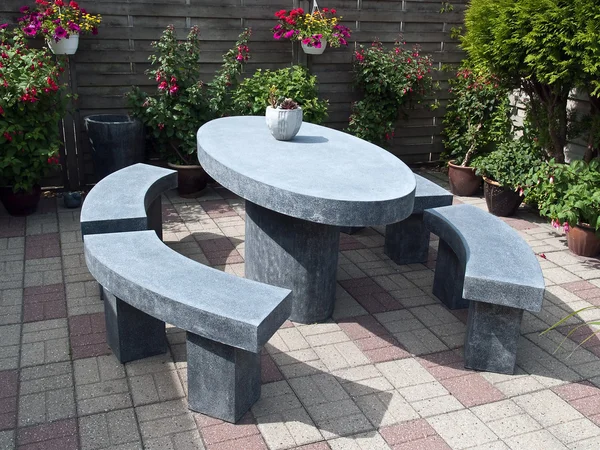 Beautiful garden stone seating corner — Stock Photo, Image