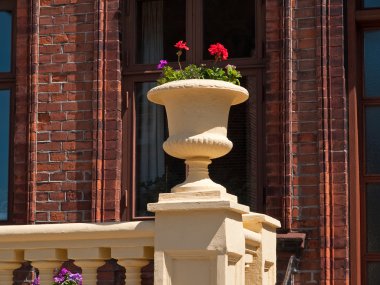 Beautiful vintage stone planter with flowers clipart