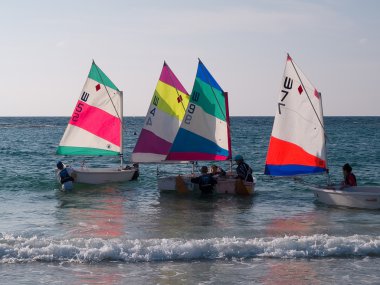 Children learning to sail clipart