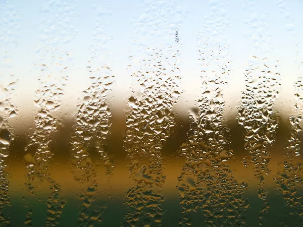 Gotas de agua en vidrio de ventana — Foto de Stock