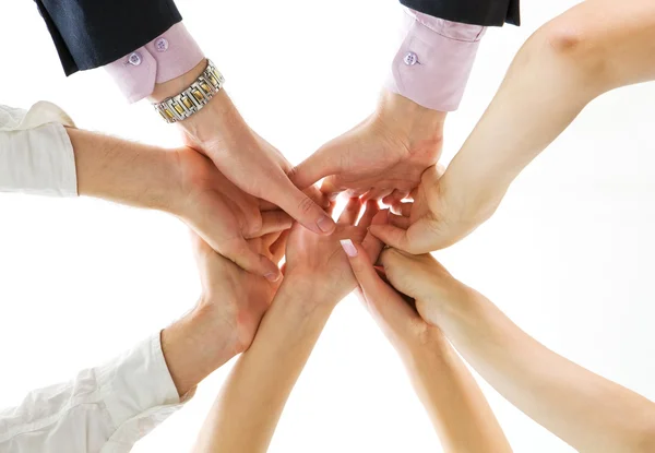 stock image hands up of business team