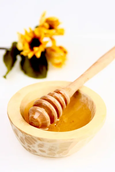 Honung i en kastrull — Stockfoto