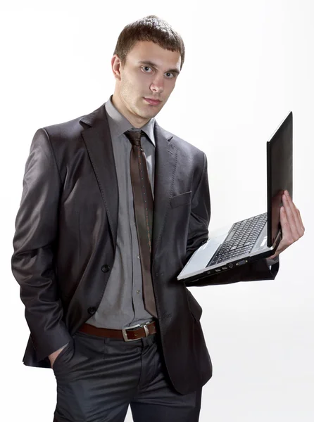 Young Businessman Holding laptop — Stock Photo, Image