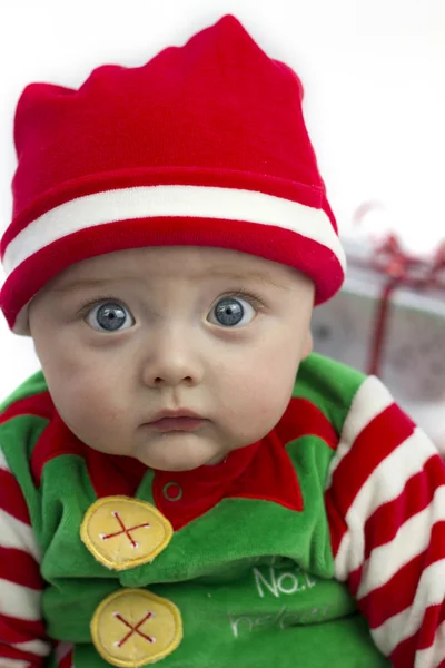 Baby at christmas with present — Stock Photo, Image