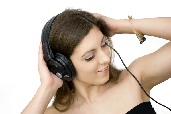 Meisje luistert naar muziek — Stockfoto