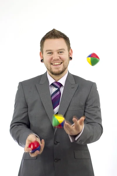 Šťastný obchodní žonglér — Stock fotografie