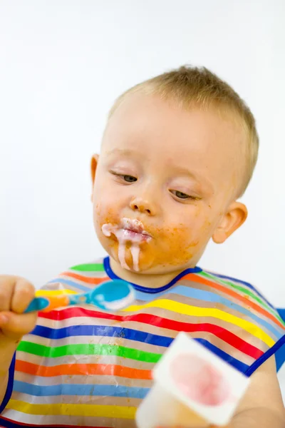 Messy Baby Checks Calorie Content — Stock Photo, Image