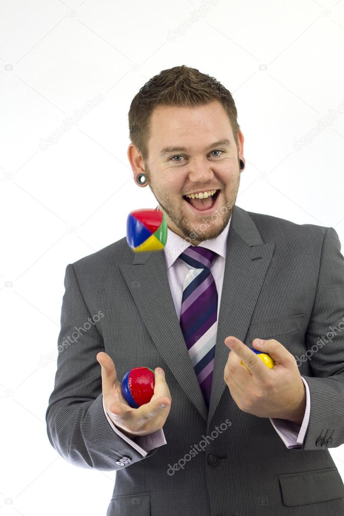 Happy Juggling Businessman