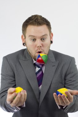 Businessman Juggling clipart