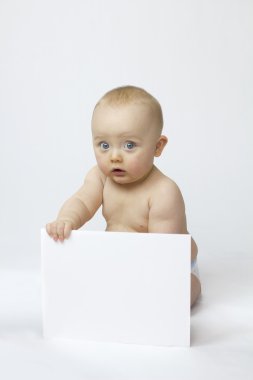 White Isolation of Baby with white board clipart