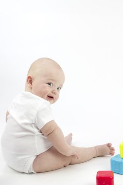 Cute Happy Baby with Toys clipart