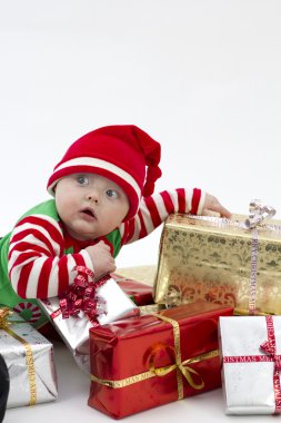 Festive Baby on Presents clipart