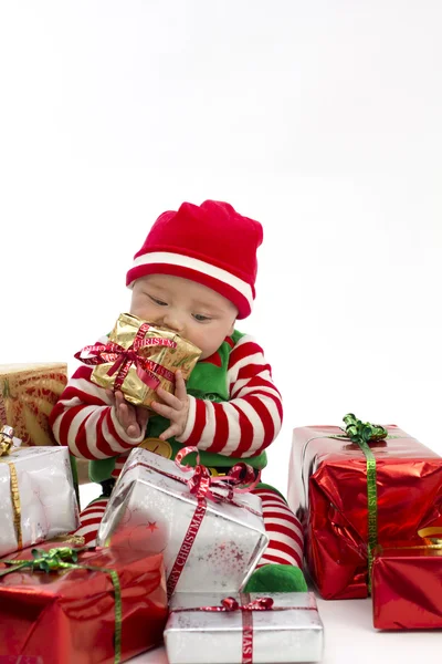 Babys eerste eten kerstcadeau Stockfoto