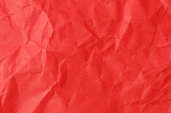 Zmačkaný červený papír pozadí — Stock fotografie