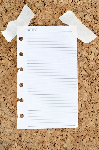 Notepad page on cork board — Stock Photo, Image