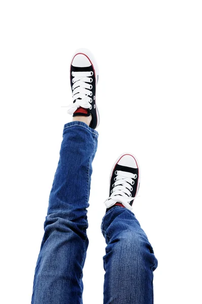 В джинсах и кроссовках — стоковое фото