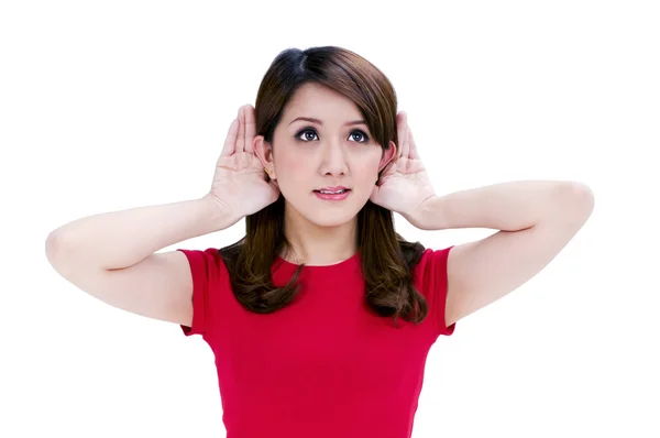 Vonzó fiatal nő kéz tartaná hátulról a fülét — Stock Fotó