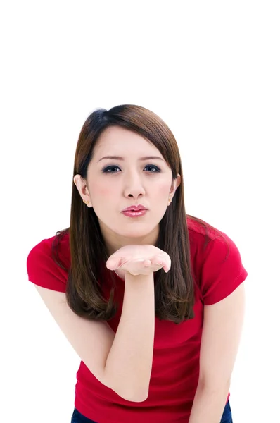 Attractive young woman blowing a kiss — Stock Photo, Image