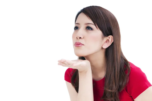 Cute young woman blowing a kiss — Stock Photo, Image